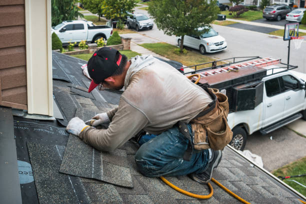 Professional Roofing technician working in Howard, CO